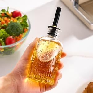 Baalaka Glass Olive Oil Dispenser Bottle Set, 7 oz, 2 Pack | Glass oil dispenser for kitchen with metal spouts; small oil bottles with funnel, labels and stoppers for syrup and juice