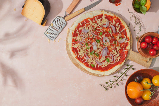 Pizza Cutting Boards: Wood, Steel, or Stone