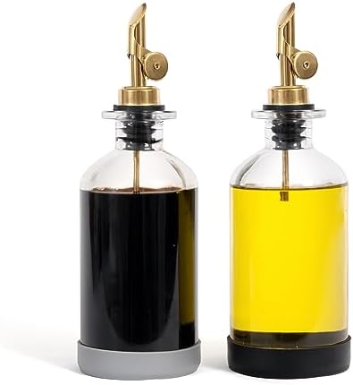 STOVE SHELF Oil and Vinegar Dispenser Set - Oil Dispensers with Silicone Base - Protects the Finish of Your StoveShelf - Glass Bottle with Gold Dispenser - Set of 2