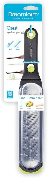 Dreamfarm Ozest Self-Cleaning Zester with Pop Button - 1mm Fine Zesting | Grates fine, citrus zest, parmesan, nutmeg and spices with concave, sharp stainless steel plane and non-slip silicone foot