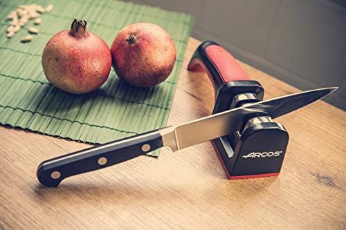 Arcos Sharpeners Manual Knife Sharpener tool. Made of ABS + TPE. Carbide and Ceramic Rollers. Keep Your Knives Razor Sharp. Black and Red Color