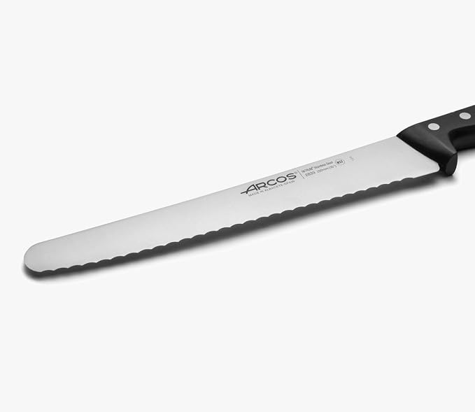 Arcos Pastry Knife/Cake Knife 10 Inch Nitrum Stainless Steel and 250 mm blade. Ergonomic Polyoxymethylene POM Handle. Polypropylene core with soft rubber coating. Series Universal. Color Black