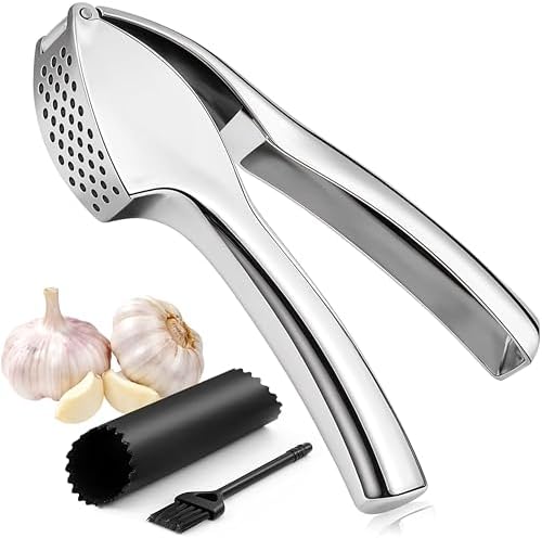 Garlic press includes cleaning brush and silicone peeler that is used for mincer/grater/smasher/crusher. Essential Kitchen Utensil for Effortless prep for home and kitchen must haves.
