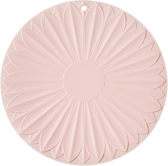 Trivet for Hot Dishes and Pots, 7 Inch Round Silicone, Pink | Food-grade silicone, heat resistant to 446F. Use as trivet, coffee mat, or placemat. Anti-slip, dishwasher safe, stackable.