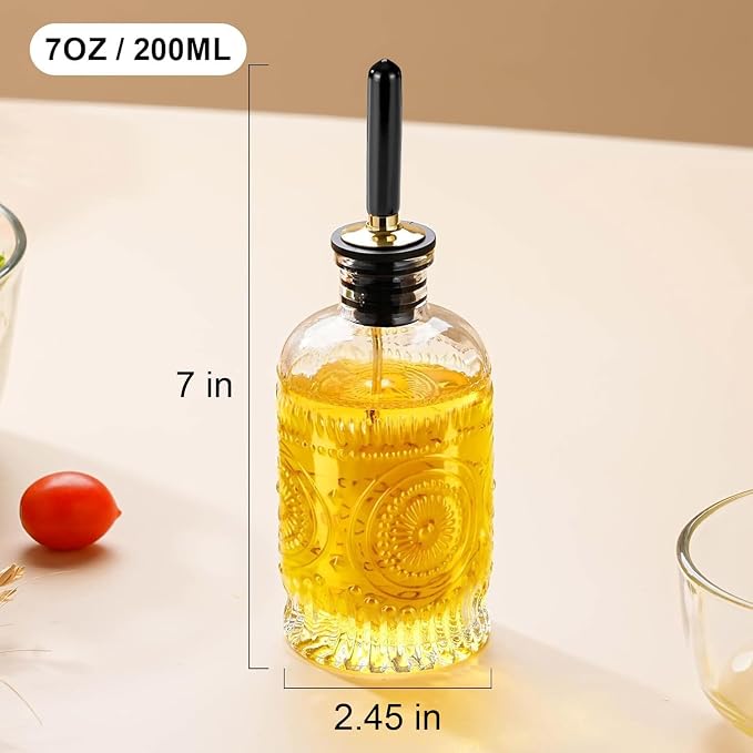 gegewawa Glass Olive Oil Dispenser Bottle, Small 7oz, Metal Spout, 1 Pack | This small olive oil dispenser has embossed glass for grip and vintage kitchen style; its clear body shows when to refill