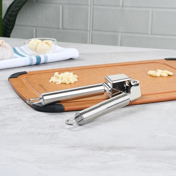 Restaurantware Stainless Steel Garlic Press - German Standard Garlic Mincer Tool Easy to Squeeze and Clean, Dishwasher Safe - Heavy Duty Garlic Chopper Tool for Ginger, Seeds