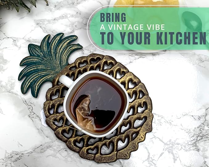 Comfify Cast Iron Pineapple Trivet – 5.9"×9" – Rubber Pegs Included | Gold; cast iron; 5.9"L x 9"W x 0.59" thick; rubber peg feet + spare set; tropical vintage; kitchen dining table