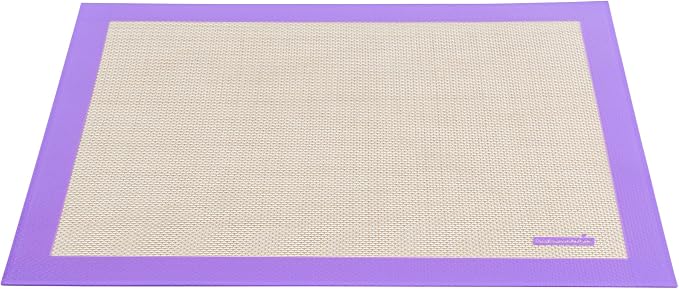 Restaurantware Half Size Baking Mat 1 Heat-Resistant Cooking Mat - Allergen-Safe Reusable And Ultra-Durable Tan And Purple Silicone Nonstick Mat For Pans And Rolling 11.8 x 15.75 Inch