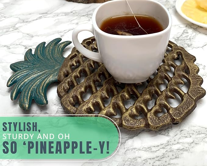 Comfify Cast Iron Pineapple Trivet – 5.9"×9" – Rubber Pegs Included | Gold; cast iron; 5.9"L x 9"W x 0.59" thick; rubber peg feet + spare set; tropical vintage; kitchen dining table