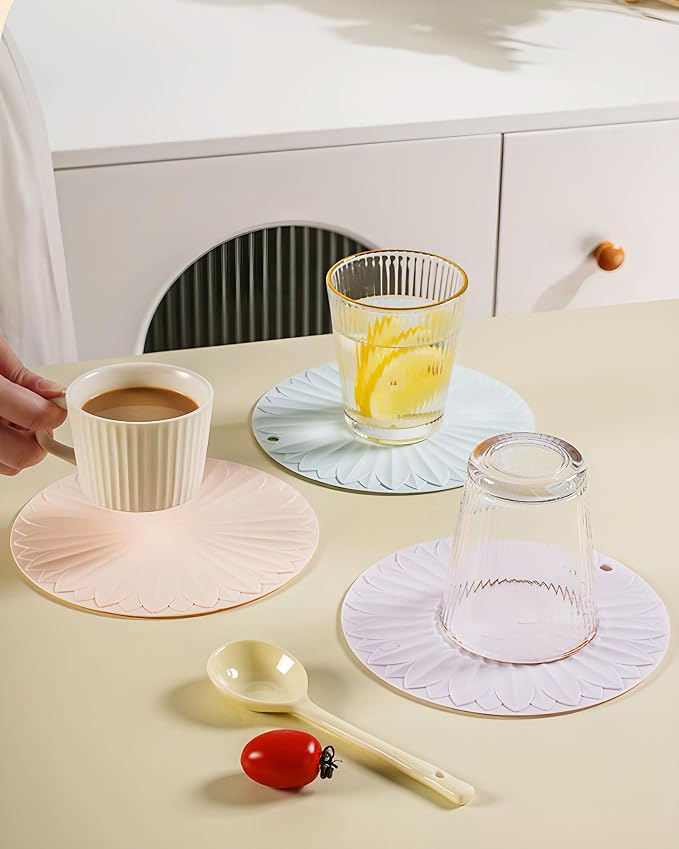 Trivet for Hot Dishes and Pots, 7 Inch Round Silicone, Pink | Food-grade silicone, heat resistant to 446F. Use as trivet, coffee mat, or placemat. Anti-slip, dishwasher safe, stackable.