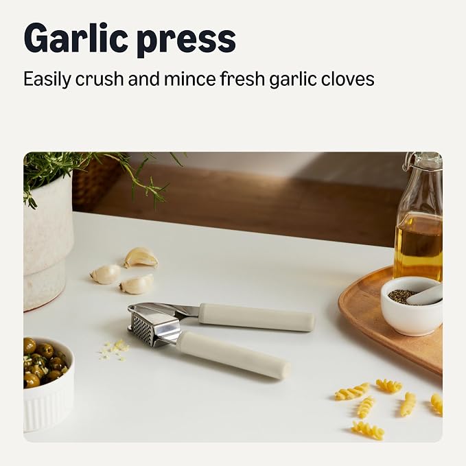 Amazon Basics Garlic Press, Stainless Steel, Soft Grip Handle, Dishwasher-Safe, Linen Gray
