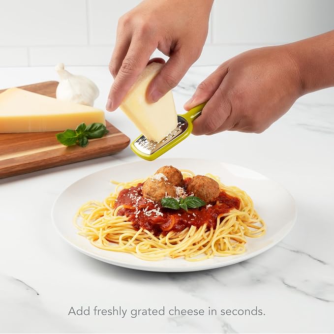 Joie Mini Grater, Handheld Small Shredder with Ergonomic Handle, Ideal for Cheese, Garlic and Vegetables, Stainless Steel, BPA-Free, Multipurpose Kitchen Tool, Colors May Vary