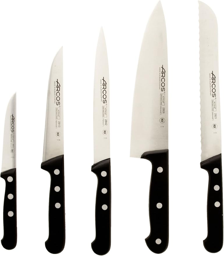 ARCOS Knife Set 5 pieces Nitrum Stainless Steel. Greater cutting power. Pine Wood Block. Ergonomic Polyoxymethylene POM Handle. Series Universal. Greater control. Color Black