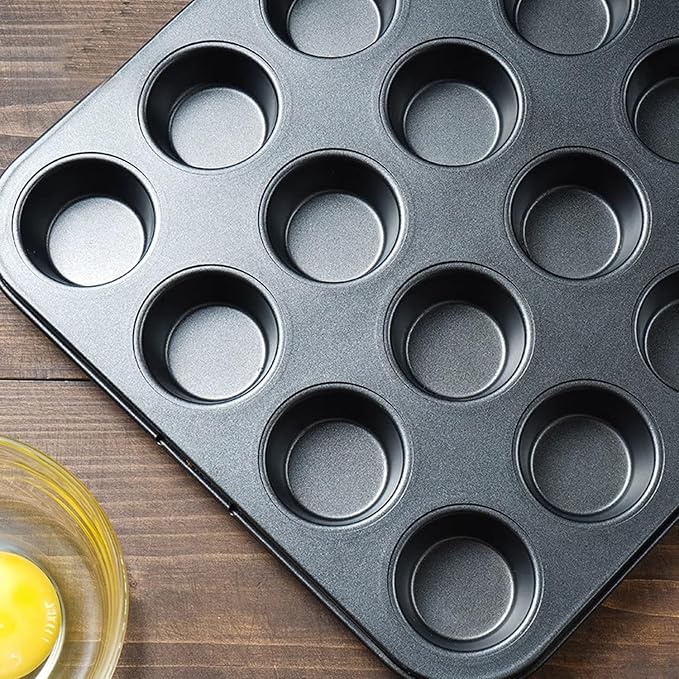 Nonstick 24 Cups Mini Muffin Pan with Extended Handles for Easy Grip, Carbon Steel Steel to Promoted Even Baking, Dishwasher Safe (Black)