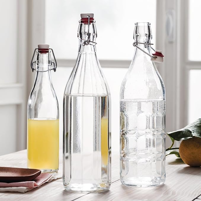 Bormioli Rocco Moresca Swing Top Bottles Set of 2-33.75 oz Airtight Glass Containers with Vintage Design for Oils, Vinegars, Liqueurs & Homemade Dressings - Reusable Italian Glass