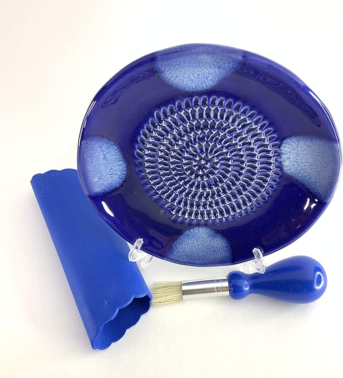 BonCera, All-in-one Premium Ceramic Garlic Grater Plate 4-Piece Set - Blue Cross Glazed Design and Style - For Garlic, Ginger, Chocolate, and more! - Comes with 5.25" Plate, Peeler, Brush, and Stand